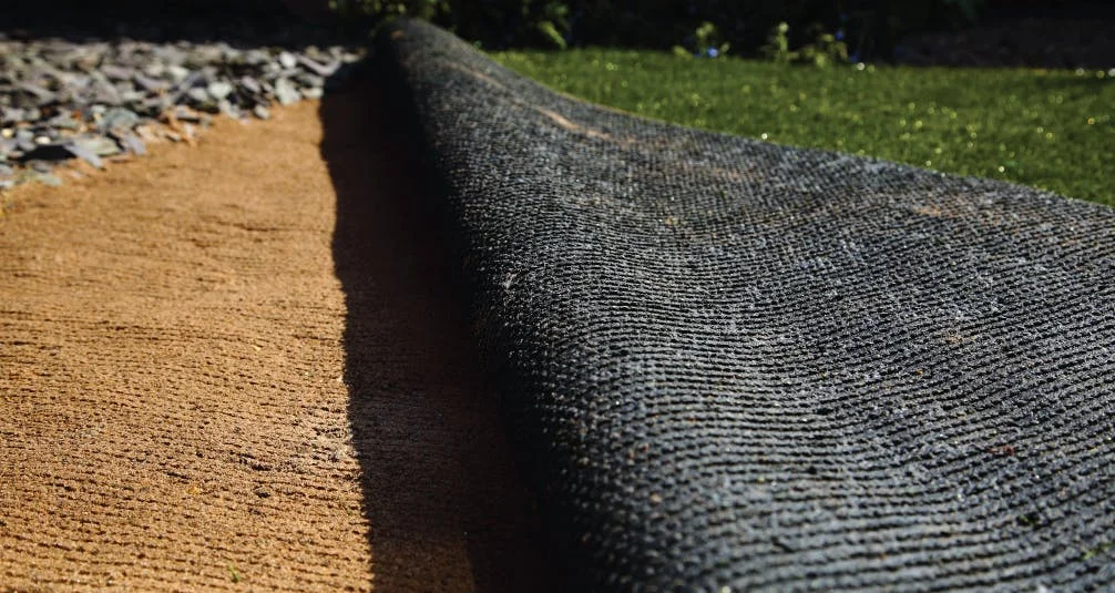 Artificial grass on top of silica sand before installation